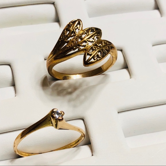 2 stamped vintage gold tone rings
